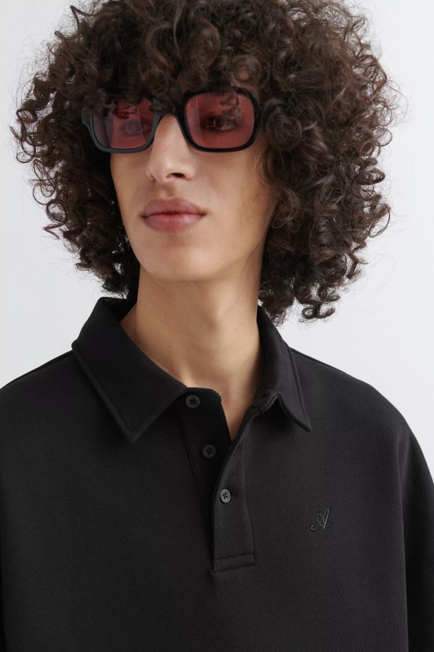 Axel Arigato Zwart Roze Nova Zonnebril